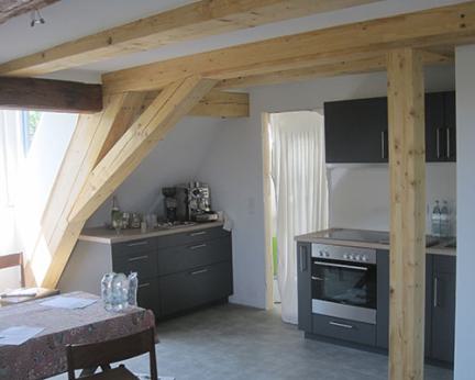 Kuenstle Holzbau Innenausbau mit Erhaltung des Gebälks